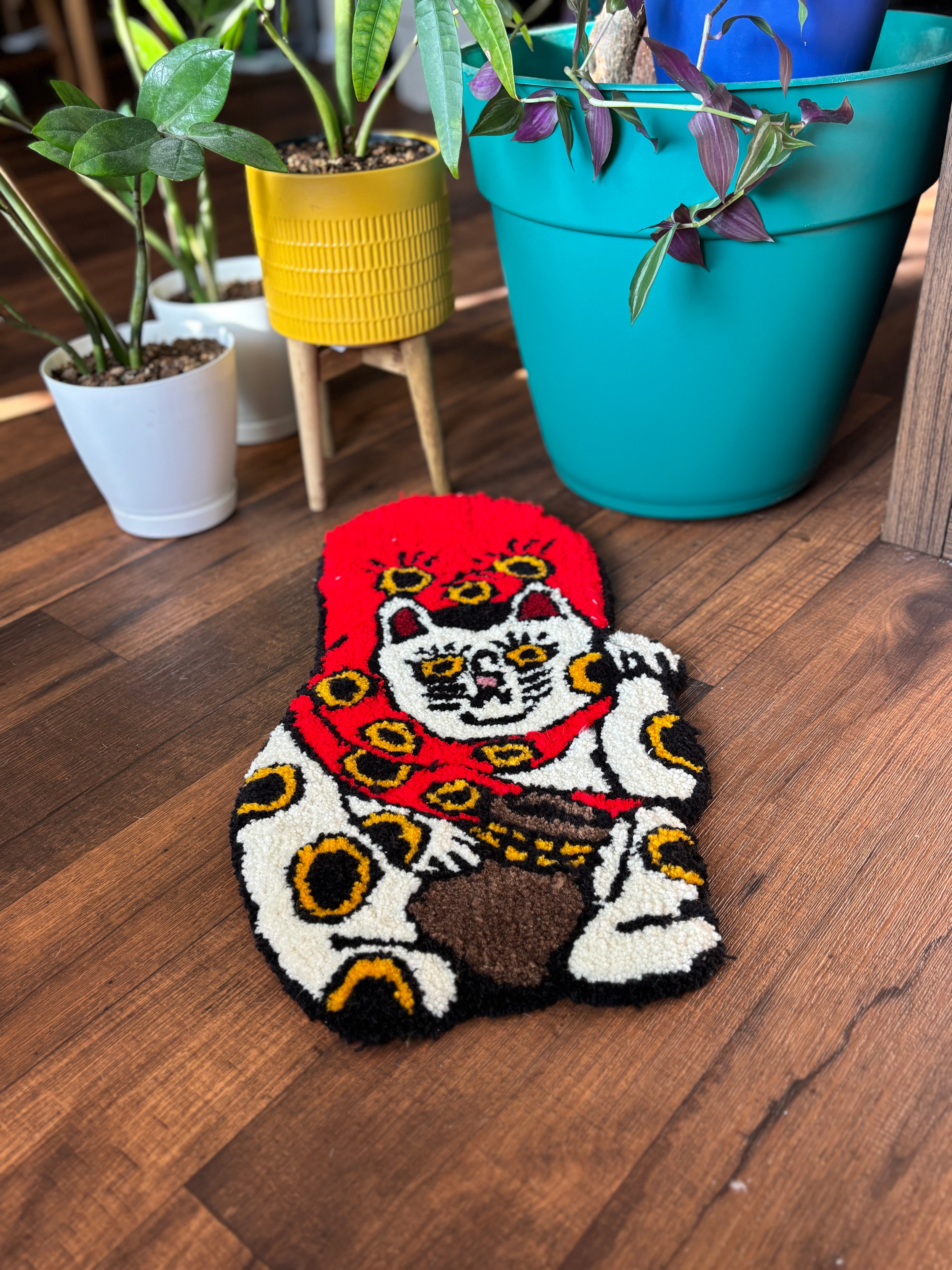 Maneki-neko with coinbag